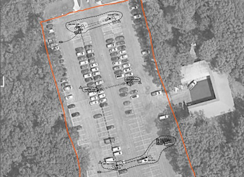 A satellite view of Oakton College's C parking lot with an orange highlight around it to denote constuction.